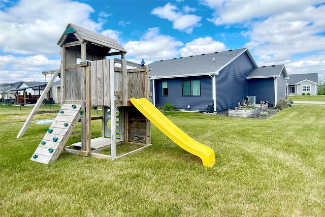 1932 Strauss Ave, Adel, IA 50003 - view of jungle gym featuring a lawn
