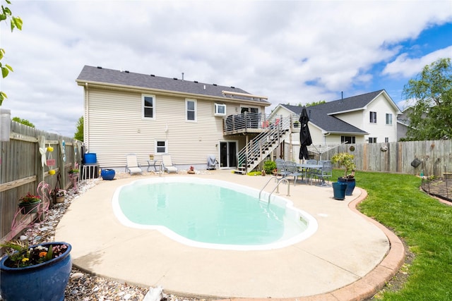 704 13th St SE, Altoona, IA 50009 - view of swimming pool with stairway and a patio area