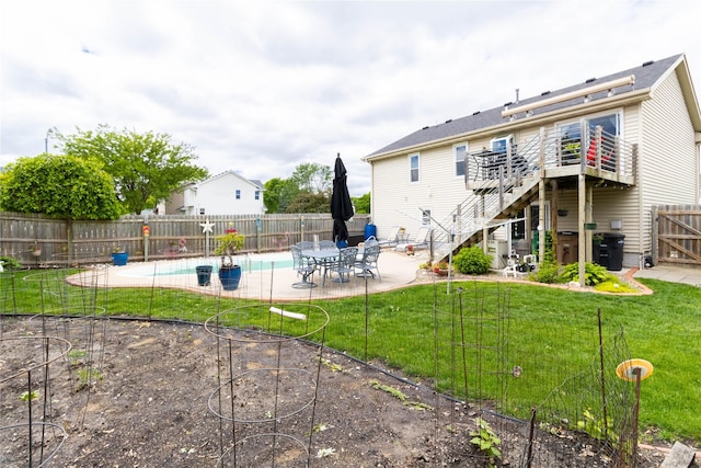 704 13th St SE, Altoona, IA 50009 - rear view of property with a patio, stairs, and a deck