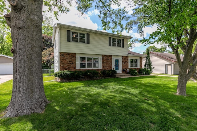 500 8th St, Waukee, IA 50263 - colonial house featuring brick siding and an outdoor structure