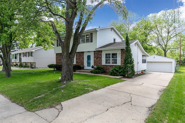 500 8th St, Waukee, IA 50263 - view of front of house with an outbuilding, brick siding, a detached garage, and a front yard