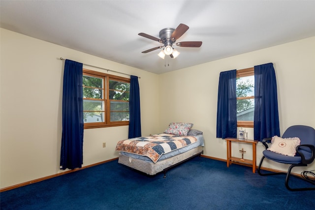 500 8th St, Waukee, IA 50263 - carpeted bedroom with a ceiling fan and baseboards