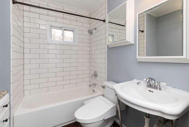 4101 Muskogee Ave, Des Moines, IA 50312 - full bath featuring toilet, shower / bath combination, and a sink