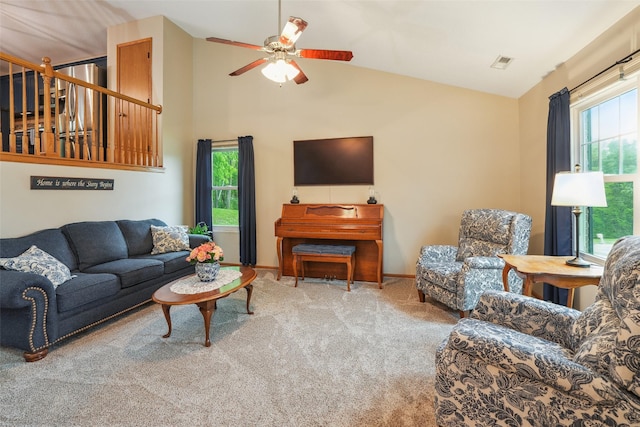 5200 Pine Valley Dr, Pleasant Hill, IA 50327 - living room featuring vaulted ceiling, carpet floors, ceiling fan, and baseboards