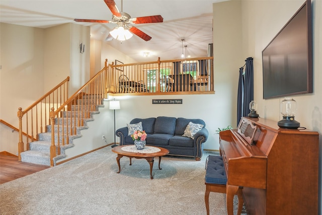 5200 Pine Valley Dr, Pleasant Hill, IA 50327 - living room featuring a ceiling fan, carpet floors, stairs, and baseboards
