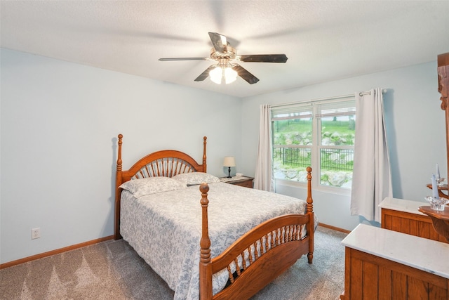 5200 Pine Valley Dr, Pleasant Hill, IA 50327 - bedroom with light carpet, baseboards, and ceiling fan
