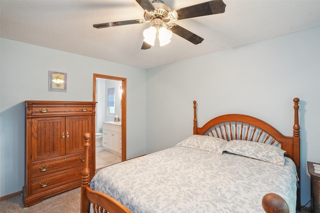 5200 Pine Valley Dr, Pleasant Hill, IA 50327 - bedroom with light carpet, ensuite bathroom, and a ceiling fan