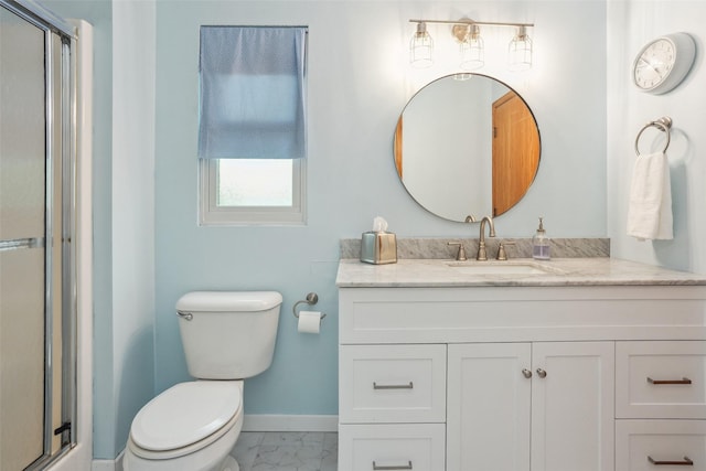 5200 Pine Valley Dr, Pleasant Hill, IA 50327 - full bath featuring baseboards, vanity, an enclosed shower, toilet, and marble finish floors
