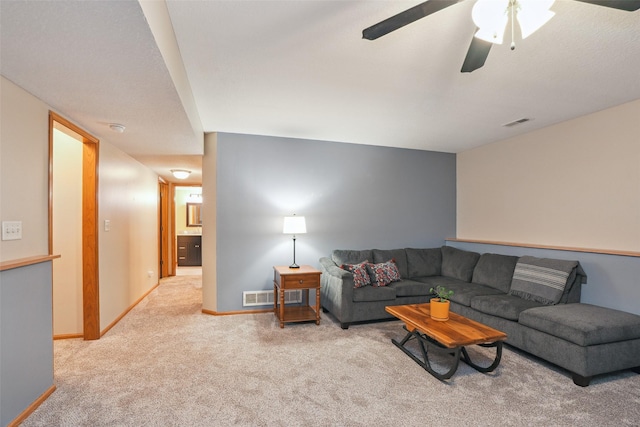 5200 Pine Valley Dr, Pleasant Hill, IA 50327 - living area with carpet floors, baseboards, and ceiling fan