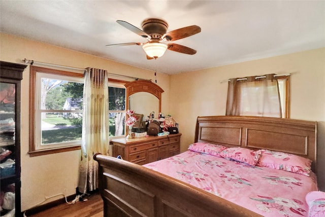 3517 50th St, Des Moines, IA 50310 - bedroom featuring wood finished floors and ceiling fan