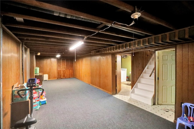 3517 50th St, Des Moines, IA 50310 - finished basement featuring wooden walls, stairs, carpet flooring, and washer / clothes dryer