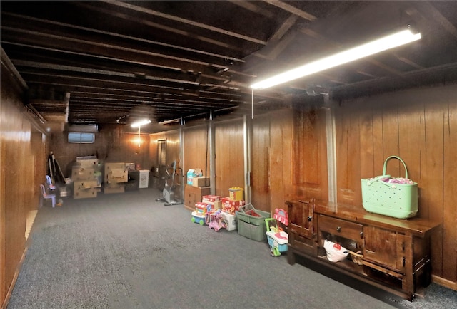 3517 50th St, Des Moines, IA 50310 - below grade area with carpet and wood walls