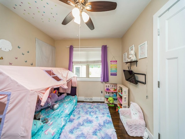 4022 Clinton Ave, Des Moines, IA 50310 - bedroom featuring wood finished floors, baseboards, and ceiling fan