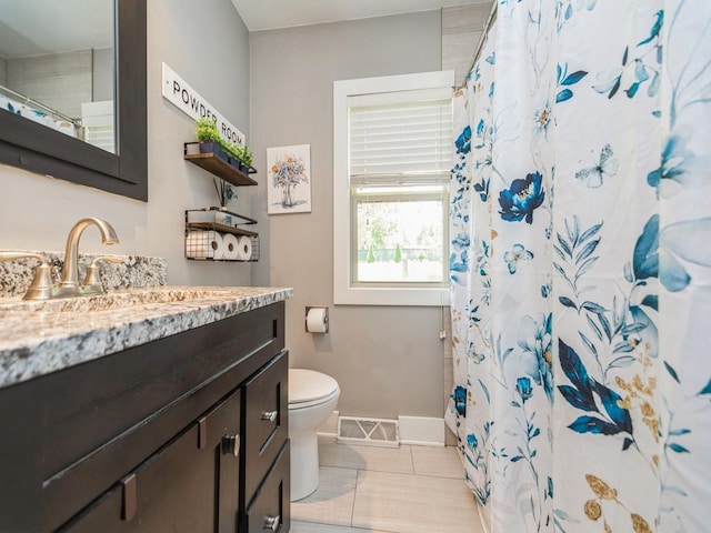 4022 Clinton Ave, Des Moines, IA 50310 - bathroom with vanity, toilet, tile patterned floors, a shower with shower curtain, and baseboards