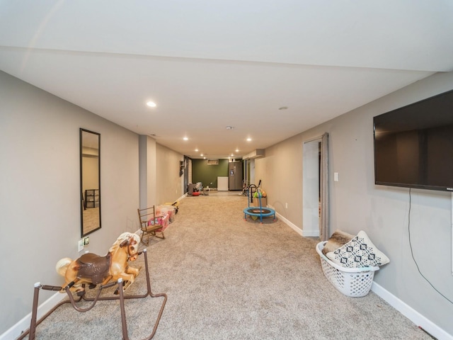 4022 Clinton Ave, Des Moines, IA 50310 - rec room with carpet floors, baseboards, and recessed lighting
