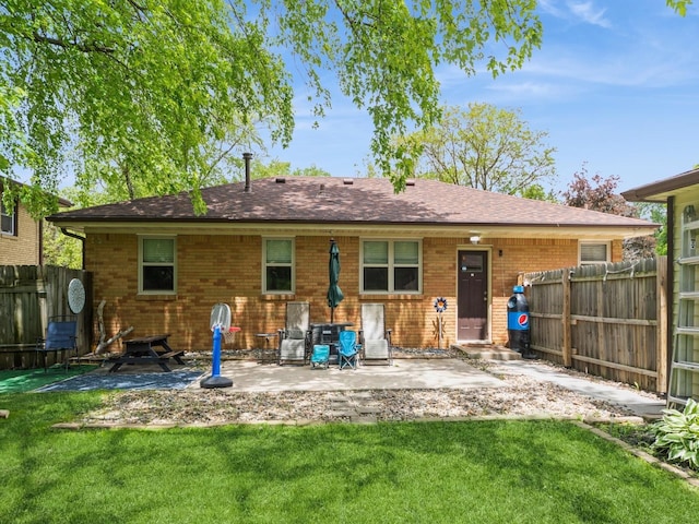 4022 Clinton Ave, Des Moines, IA 50310 - rear view of property featuring a patio and brick siding