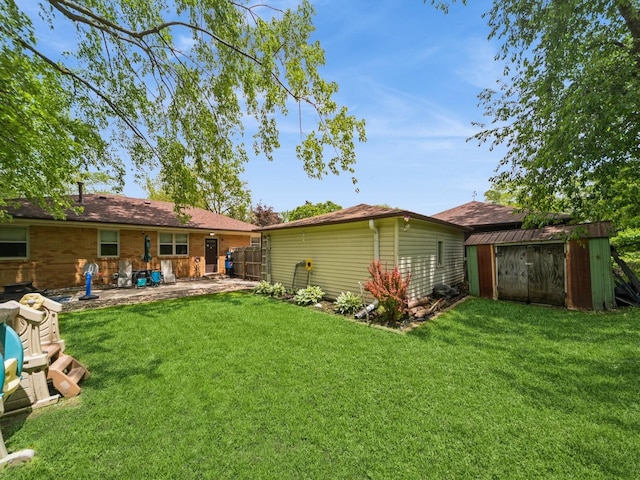 4022 Clinton Ave, Des Moines, IA 50310 - rear view of house featuring a patio