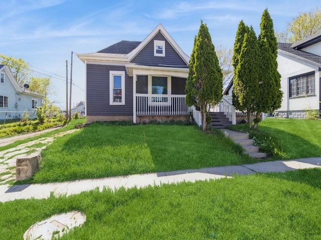 105 S 2nd St, Marshalltown, IA 50158 - bungalow-style house featuring covered porch and a front yard