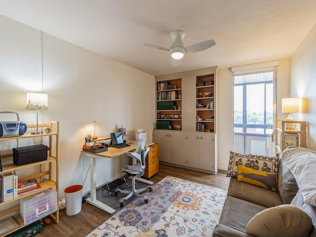 3663 Grand Ave Unit 508, Des Moines, IA 50312 - home office with wood finished floors and ceiling fan