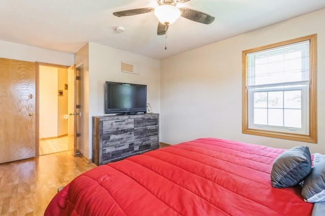 794 SE 61st St, Pleasant Hill, IA 50327 - bedroom with wood finished floors and ceiling fan