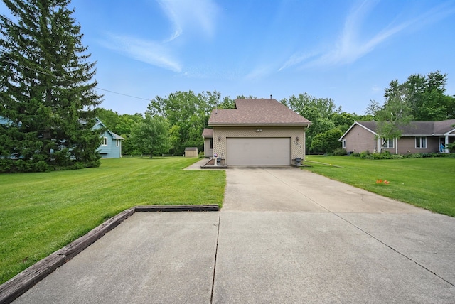 1011 NE 60th Ave, Des Moines, IA 50313 - view of front of home with a front lawn, concrete driveway, and a garage