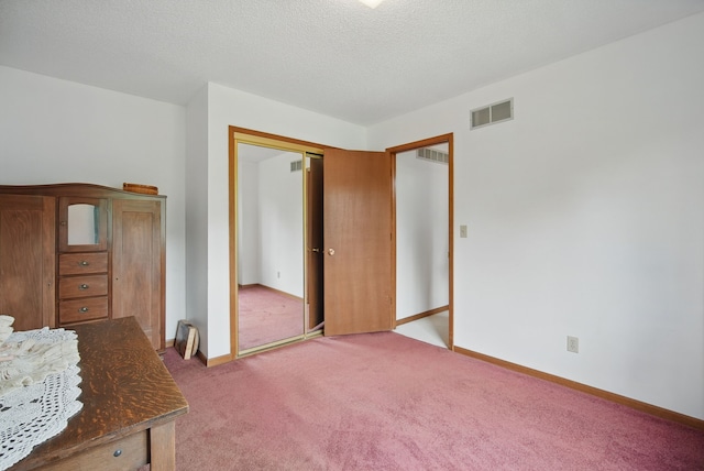 1011 NE 60th Ave, Des Moines, IA 50313 - unfurnished bedroom featuring light colored carpet, a closet, and baseboards