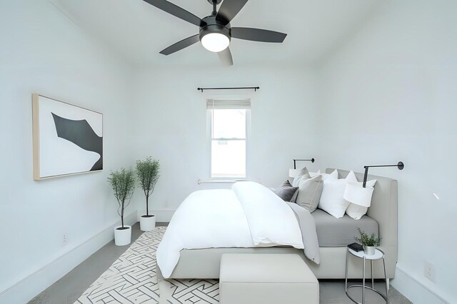 2409 45th St, Des Moines, IA 50310 - bedroom featuring baseboards and ceiling fan