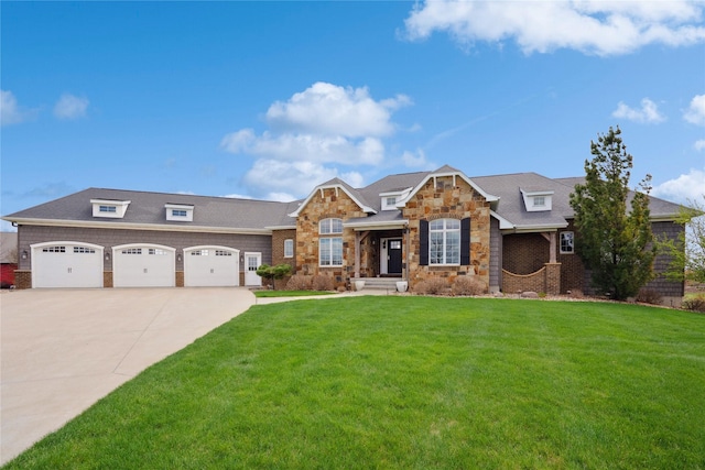 2492 55th St, Vinton, IA 52349 - view of front of house with a front yard, concrete driveway, stone siding, an attached garage, and roof with shingles