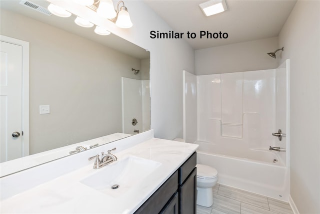 25087 Bluebird Cir, Adel, IA 50003 - bathroom featuring vanity, toilet, and bathing tub / shower combination