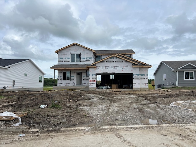 25087 Bluebird Cir, Adel, IA 50003 - property in mid-construction with a garage, dirt driveway, and covered porch
