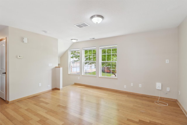 15203 Greenbelt Dr, Urbandale, IA 50323 - spare room featuring light wood-type flooring and baseboards