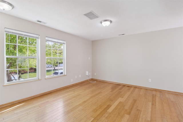 15203 Greenbelt Dr, Urbandale, IA 50323 - unfurnished room featuring light wood-type flooring and baseboards