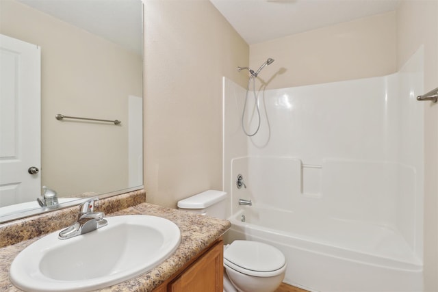 15203 Greenbelt Dr, Urbandale, IA 50323 - bathroom with vanity, toilet, and bathing tub / shower combination