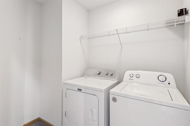 15203 Greenbelt Dr, Urbandale, IA 50323 - laundry area featuring washer and clothes dryer