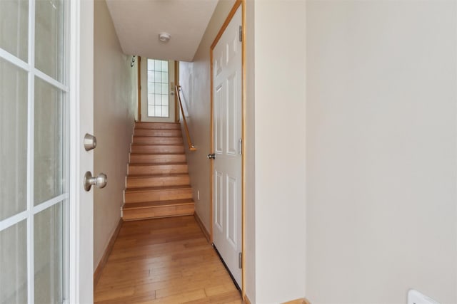 15203 Greenbelt Dr, Urbandale, IA 50323 - staircase with hardwood / wood-style floors and baseboards