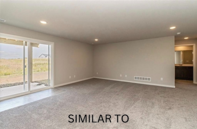 926 Willow Valley Dr, Norwalk, IA 50211 - unfurnished room with carpet floors, baseboards, and recessed lighting