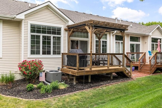 9812 Green View Ln, Johnston, IA 50131 - rear view of property with a deck and roof with shingles