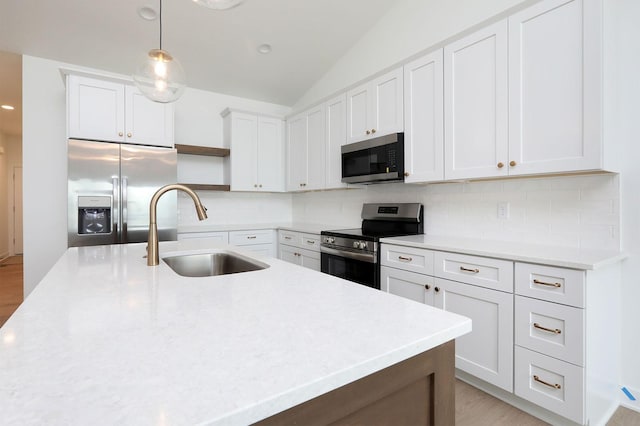 2500 NE 6th St, Grimes, IA 50111 - kitchen featuring stainless steel appliances, a sink, open shelves, decorative backsplash, and light countertops