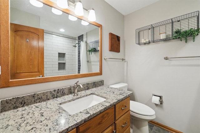 6935 NW 88th Ave, Johnston, IA 50131 - full bathroom with toilet, vanity, a shower with curtain, and baseboards