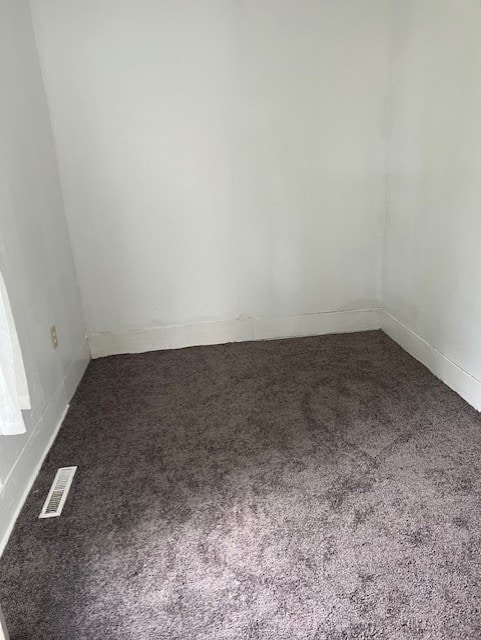 520 S Main St, Stuart, IA 50250 - carpeted spare room with baseboards