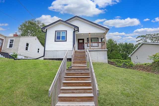 501 Kirkwood Ave, Des Moines, IA 50315 - view of front of house with stairs, a front lawn, and a porch
