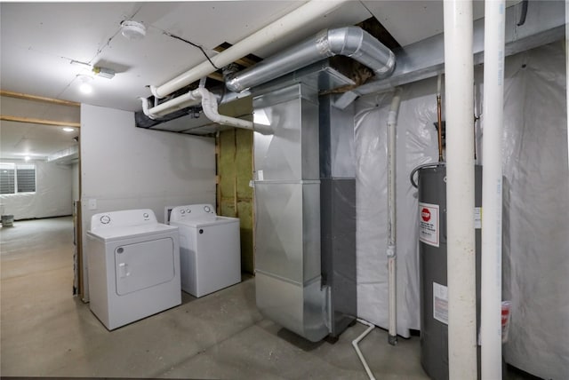 501 Kirkwood Ave, Des Moines, IA 50315 - unfinished below grade area featuring washer and clothes dryer and water heater