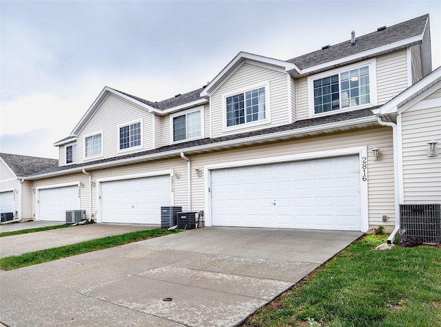 2816 Ashland Ct, Altoona, IA 50009 - view of property with a garage and driveway