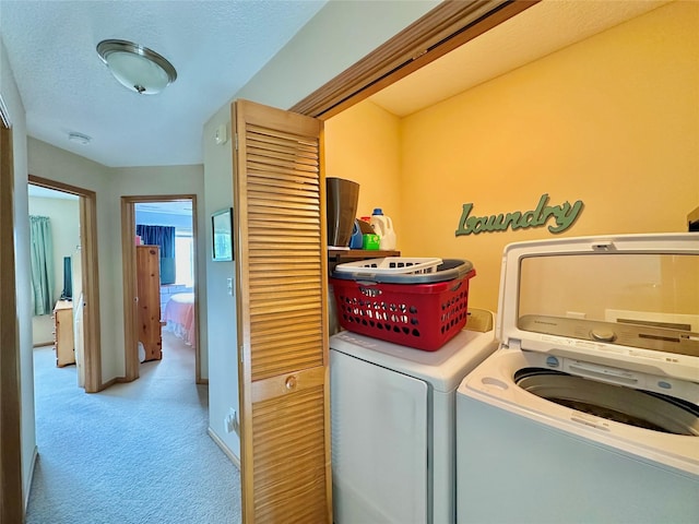 2816 Ashland Ct, Altoona, IA 50009 - washroom with carpet floors and washing machine and clothes dryer