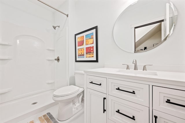 7305 NW 18th St, Ankeny, IA 50023 - bathroom featuring vanity, toilet, and a shower