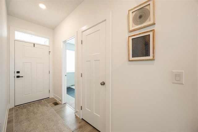 523 NE Vista Ln, Ankeny, IA 50021 - foyer entrance featuring light wood-type flooring, baseboards, and recessed lighting