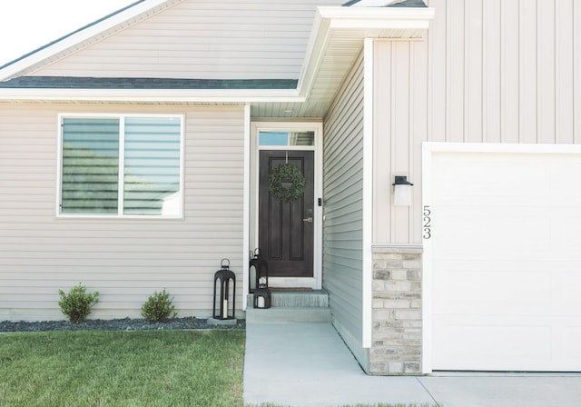 523 NE Vista Ln, Ankeny, IA 50021 - property entrance featuring board and batten siding and stone siding