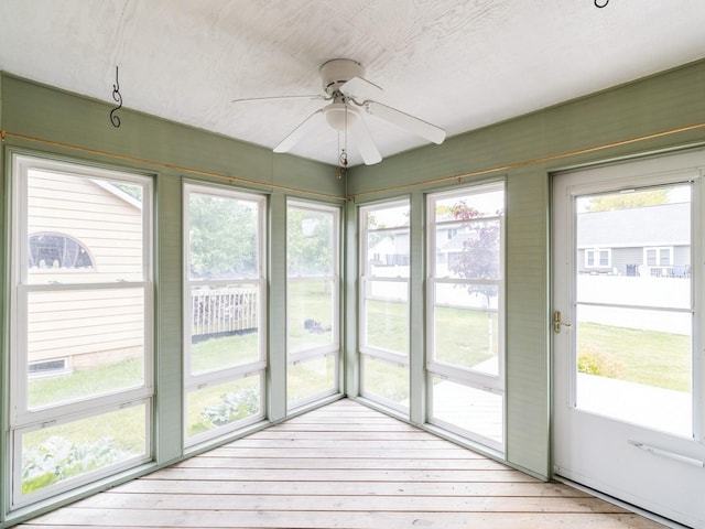 3721 Fletcher Blvd, Ames, IA 50010 - unfurnished sunroom featuring ceiling fan and healthy amount of natural light