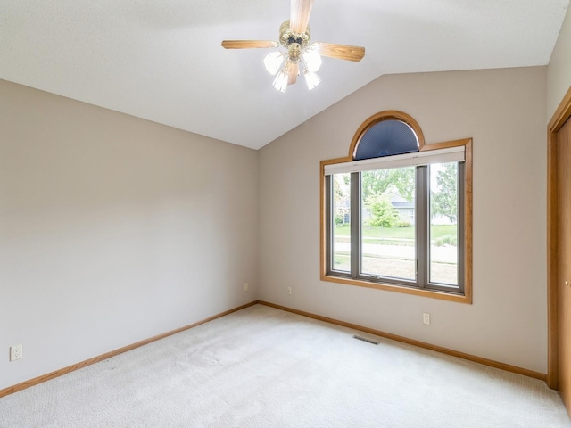 3721 Fletcher Blvd, Ames, IA 50010 - unfurnished room featuring light colored carpet, baseboards, ceiling fan, and vaulted ceiling
