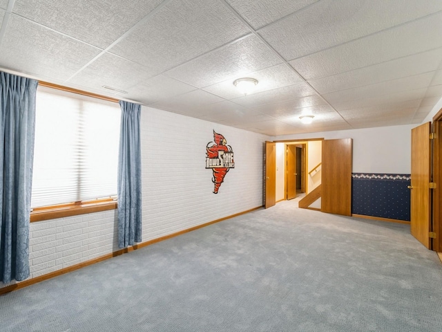 3721 Fletcher Blvd, Ames, IA 50010 - carpeted empty room with a drop ceiling and baseboards